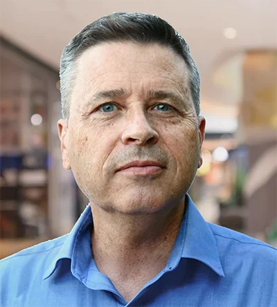 Photo of Brian Hatch smiling.